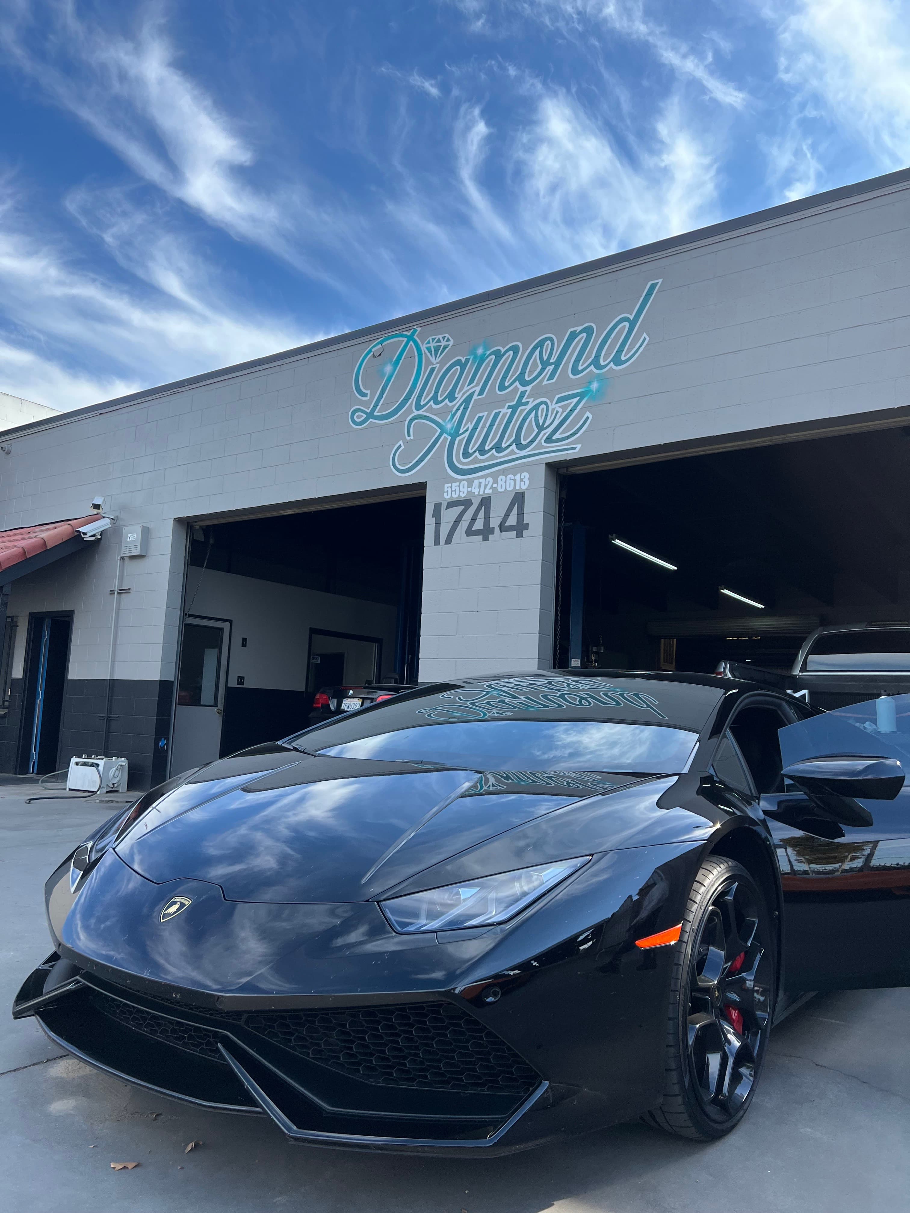 Lamborghini at Diamond Autoz storefront